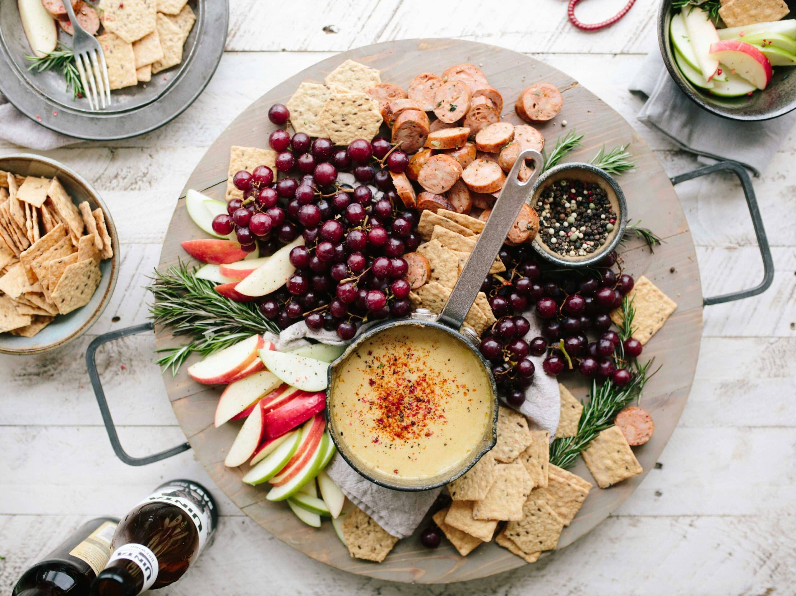 A beautifully lit, high-quality studio photograph showcasing an assortment of gluten-free snack options. In the foreground, a variety of healthy, colorful snacks are artfully arranged on a clean, minimalist surface, such as sliced fresh vegetables, nuts, seeds, gluten-free crackers, and dried fruit. The middle ground features a few open containers or packages of these gluten-free snacks, highlighting their textures and natural ingredients. The background is softly blurred, creating a calm, inviting atmosphere that emphasizes the nutritious and tasty nature of these gluten-free snack alternatives.